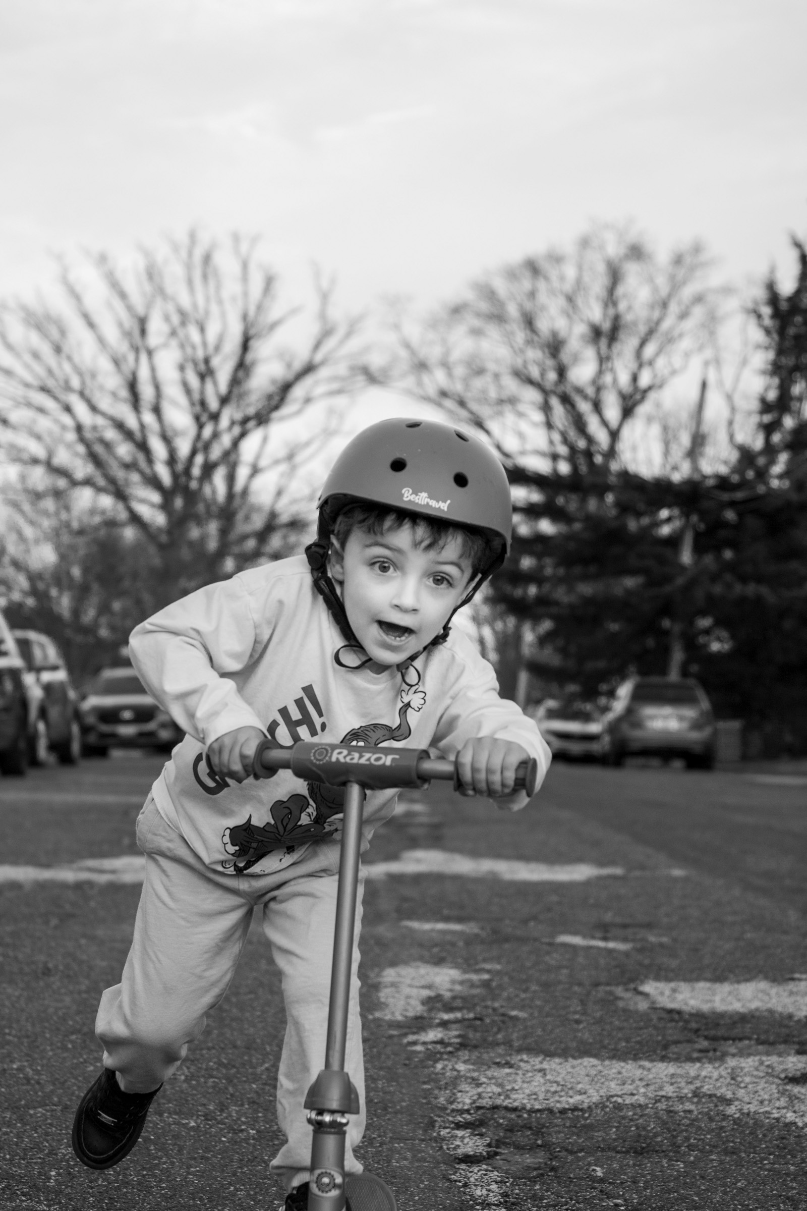 He leans into the moment on his scooter